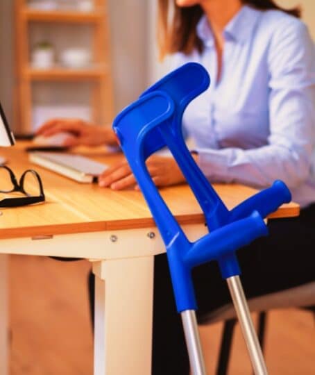 Injured Young Worker In Office After Accident