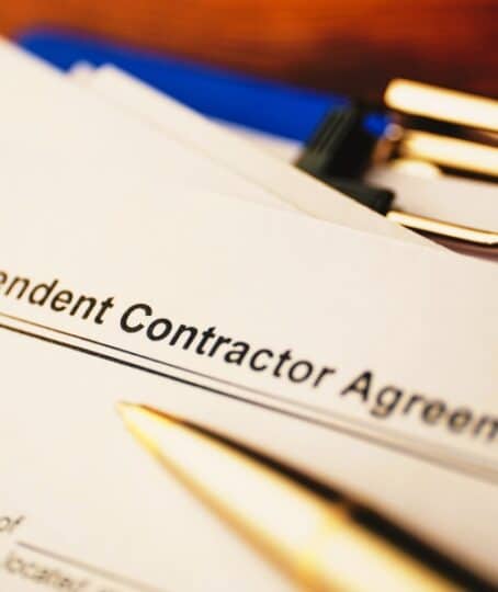 Legal document Independent Contractor Agreement on paper close up