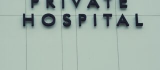 Words Private Hospital on the exterior of a hospital
