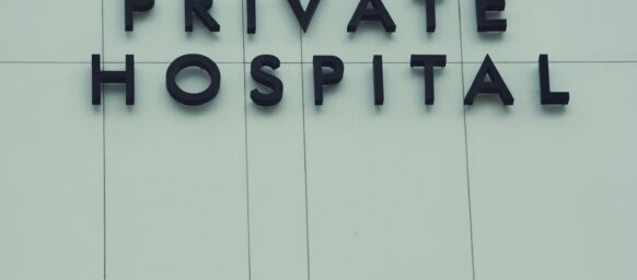 Words Private Hospital on the exterior of a hospital
