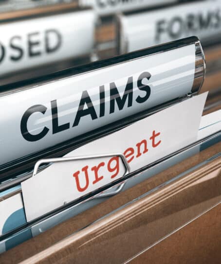 3D illustration of a folder, Focus on tab and note with the text claims and urgent. Concept of complaints management