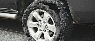 damaged truck tire after tire explosion at high speed