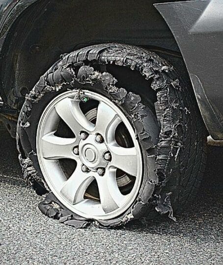 damaged truck tire after tire explosion at high speed