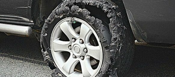 damaged truck tire after tire explosion at high speed