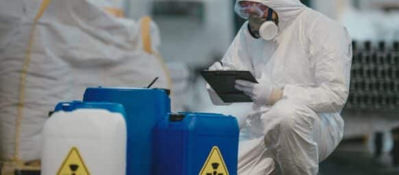 man working with toxic chemicals