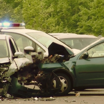 Car in a road accident. Concept of whose insurance pays in a multi-car accident in bloomington