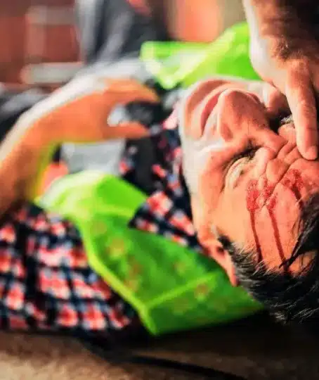 Injured construction worker laying on the ground. Jobs With the Most Workplace Accidents