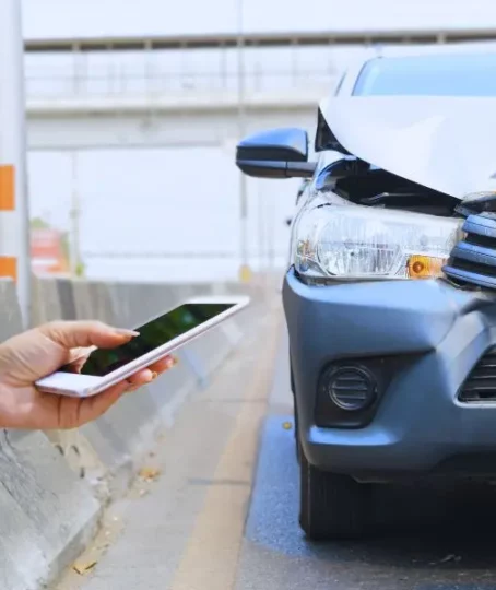 Car crash from car accident on the road in a city car pickup. injuries after car accident