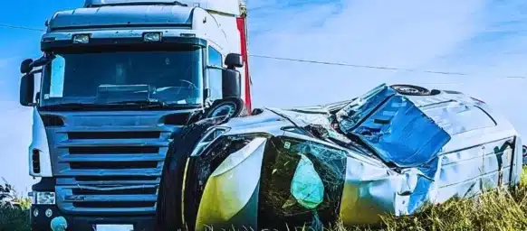 Car after a collision with a heavy truck. Truck vs car accident statistics