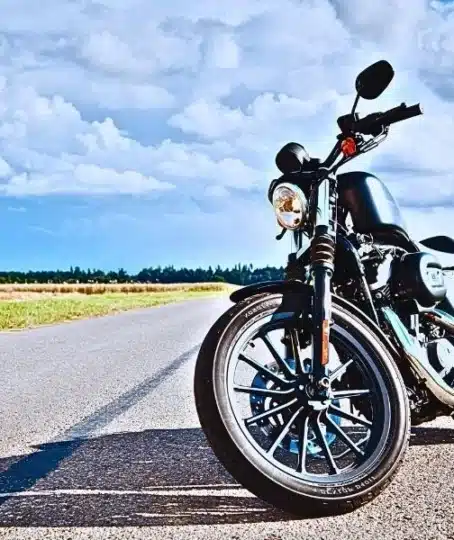 Motorcycle parked on a high way.