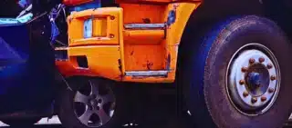 Car crash accident on the road. truck and passenger car collision. Truck Accidents Caused by Federal Safety Violations