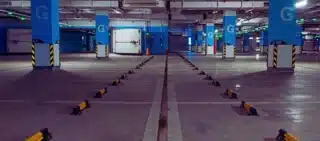 Interior of an empty, modern underground parking garage. Injured in a Parking Lot in Illinois