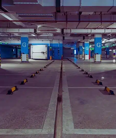 Interior of an empty, modern underground parking garage. Injured in a Parking Lot in Illinois