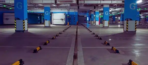 Interior of an empty, modern underground parking garage. Injured in a Parking Lot in Illinois