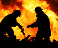 Firefighters in action battling the fire