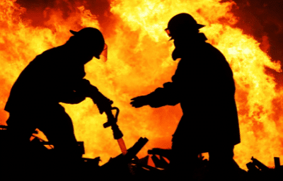 Firefighters in action battling the fire