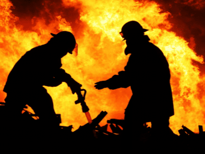 Firefighters in action battling the fire